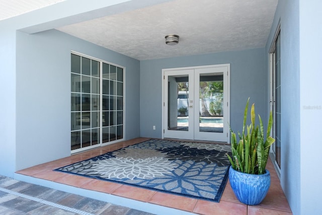 doorway to property with french doors