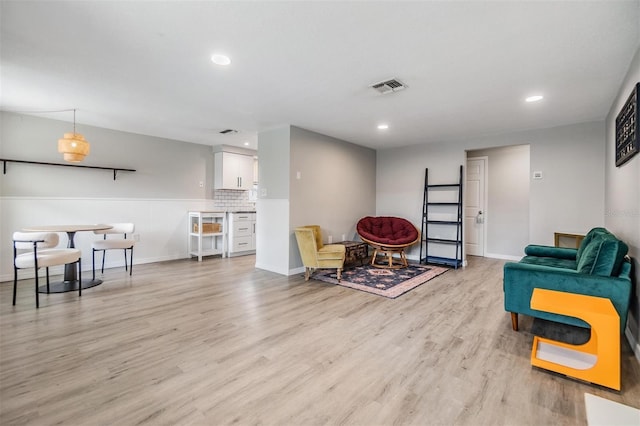 living area featuring light hardwood / wood-style floors