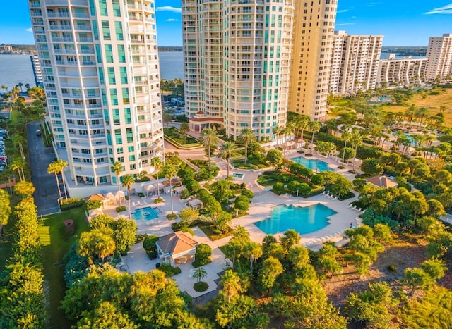 birds eye view of property with a city view