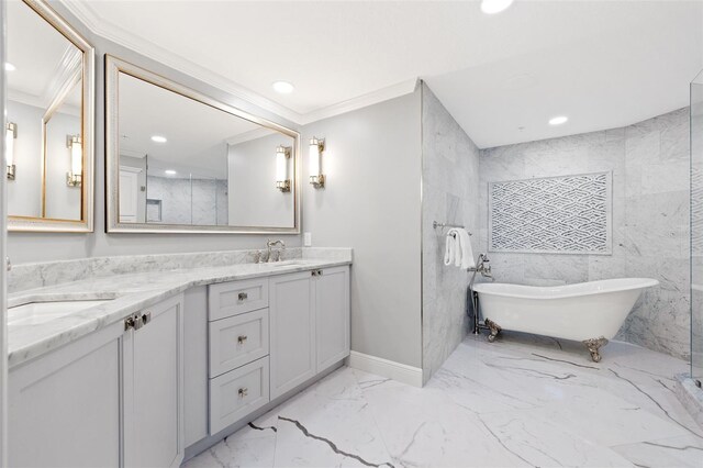 full bathroom with double vanity, marble finish floor, crown molding, a freestanding bath, and a sink