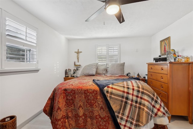 2419 Palmwood Dr, Holiday, FL 34690 - bedroom with ceiling fan