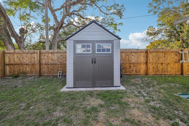 2419 Palmwood Dr, Holiday, FL 34690 - view of outbuilding with a lawn