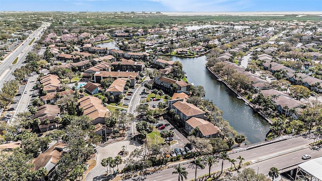 aerial view with a residential view and a water view