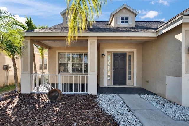 property entrance with covered porch