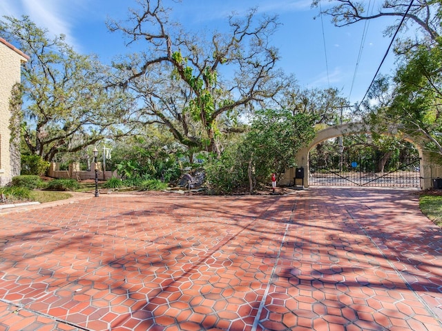 exterior space with a gate and fence