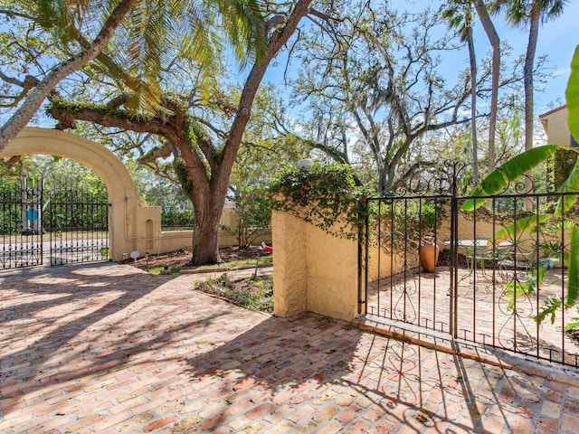 view of gate with fence