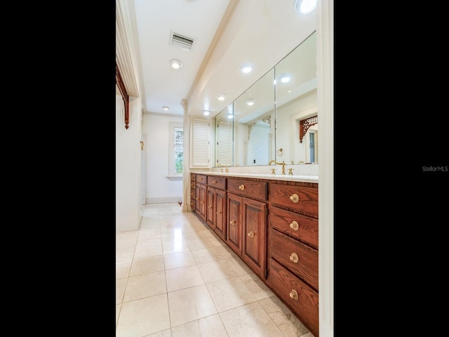 5020 S Shore Crest Cir, Tampa, FL 33609 - full bath featuring visible vents, tile patterned flooring, and double vanity