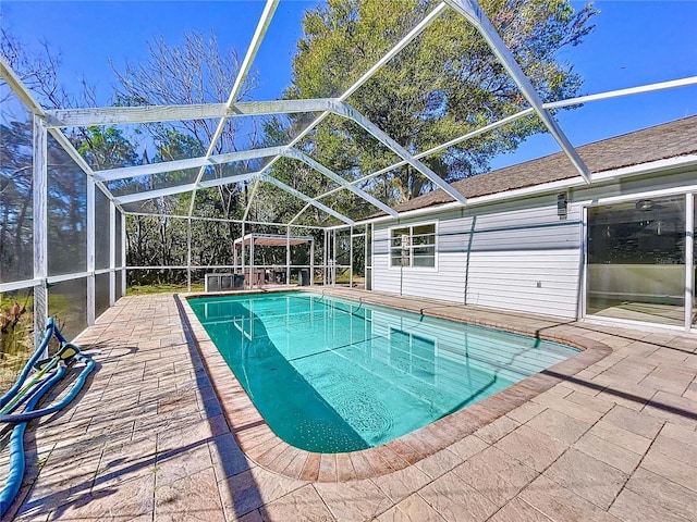 8600 Berkley Dr, Hudson, FL 34667 - view of pool featuring a lanai and a patio area