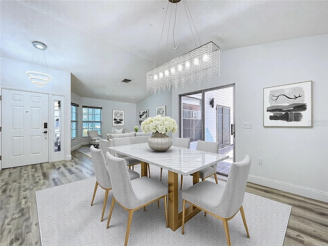 8600 Berkley Dr, Hudson, FL 34667 - dining space featuring hardwood / wood-style floors