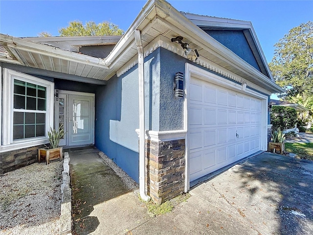 8600 Berkley Dr, Hudson, FL 34667 - exterior space with a garage