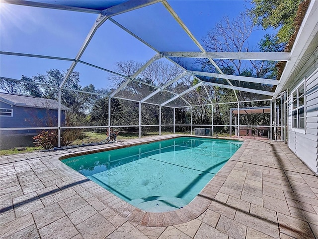 8600 Berkley Dr, Hudson, FL 34667 - view of swimming pool featuring a lanai and a patio