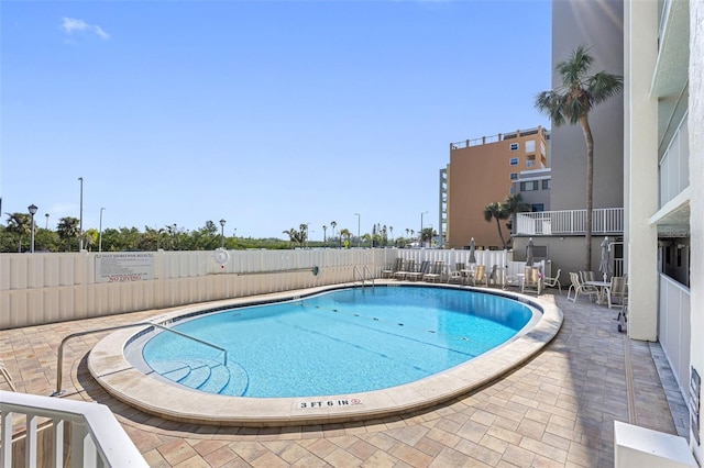 view of pool with a patio