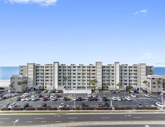 view of building exterior with a water view