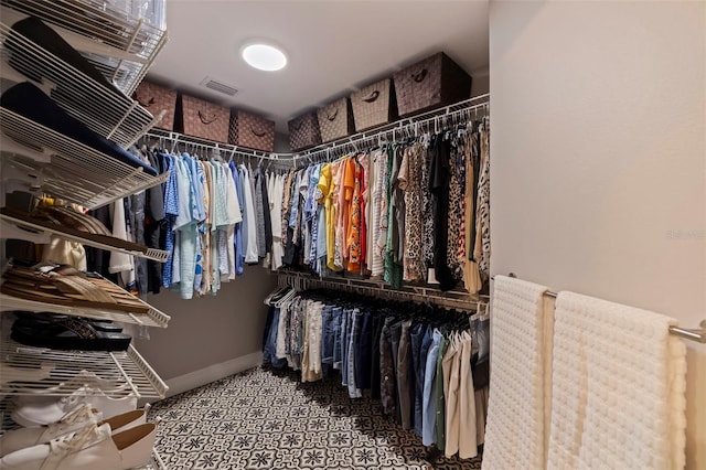 walk in closet featuring visible vents