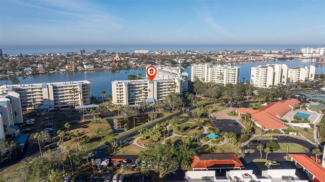 drone / aerial view with a view of city and a water view