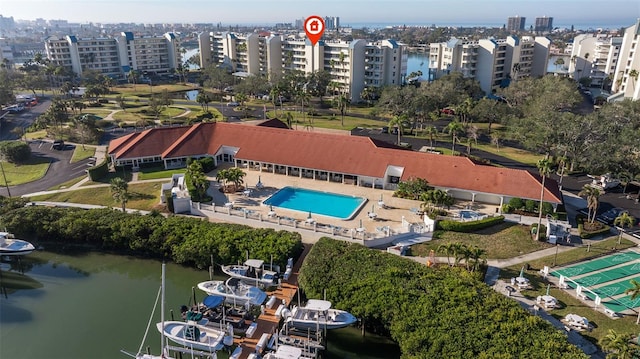 birds eye view of property with a water view