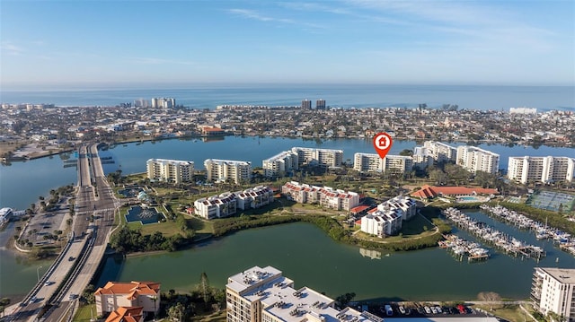 aerial view featuring a water view and a city view