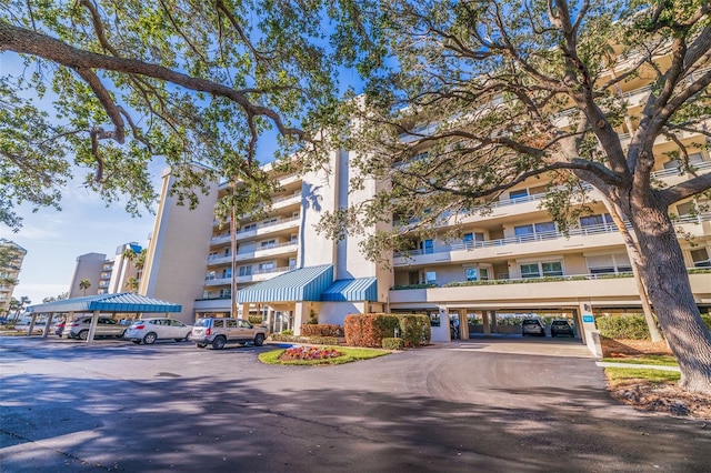 7902 Sailboat Key Blvd S Unit 206, South Pasadena, FL 33707 - view of apartment building / complex featuring covered parking