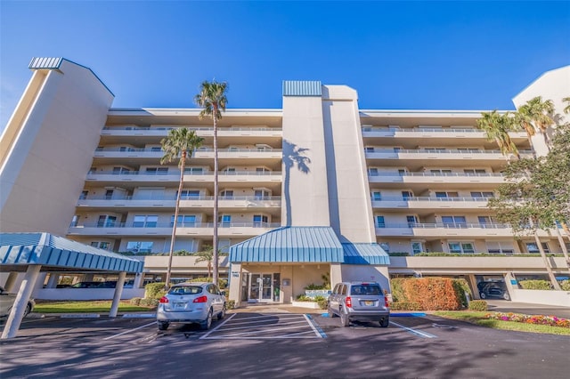 7902 Sailboat Key Blvd S Unit 206, South Pasadena, FL 33707 - view of apartment building / complex with covered and uncovered parking