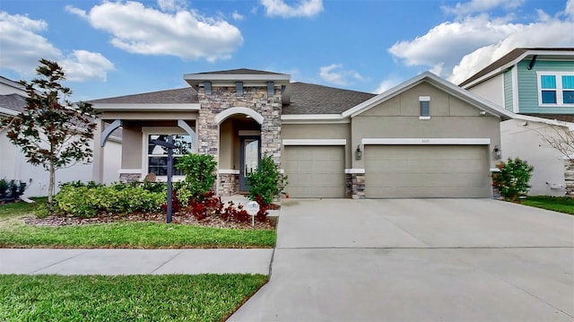 view of front of home with a garage