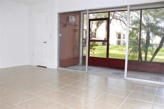 interior space featuring plenty of natural light and light tile patterned floors