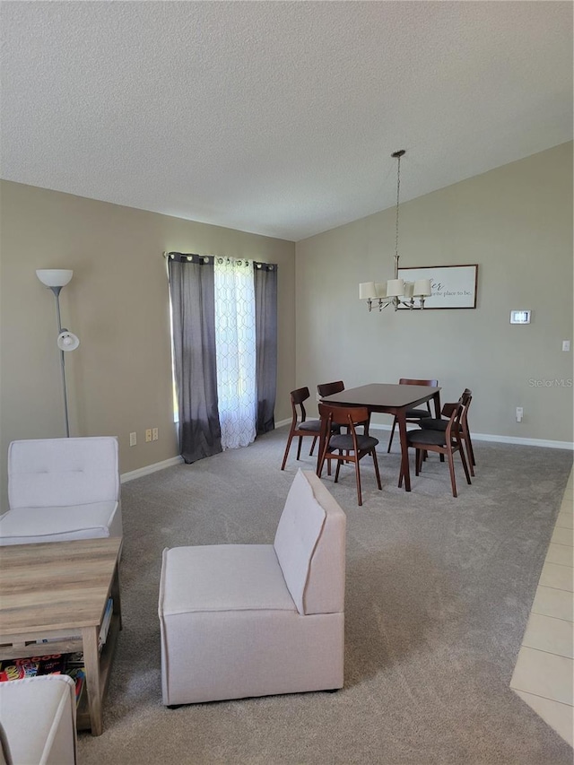 living room with lofted ceiling, an inviting chandelier, carpet, and a textured ceiling