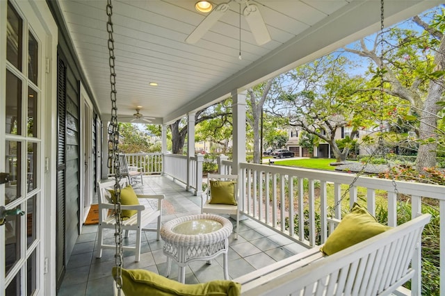 exterior space featuring ceiling fan and covered porch