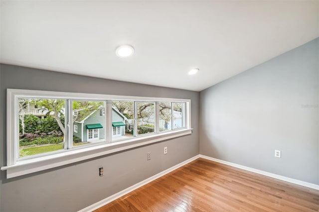 spare room with light wood-type flooring