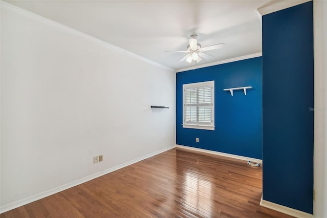 unfurnished room featuring crown molding, hardwood / wood-style floors, and ceiling fan