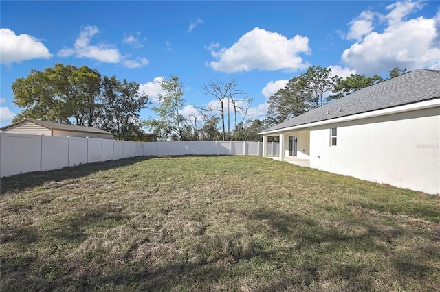 view of yard featuring a fenced backyard