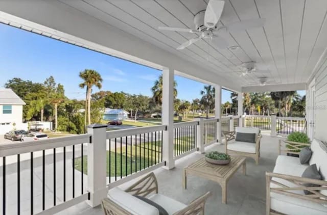 exterior space with ceiling fan, outdoor lounge area, and covered porch