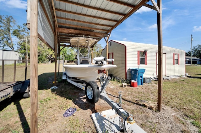 view of property exterior with an outbuilding and a lawn