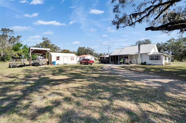 view of yard featuring a carport