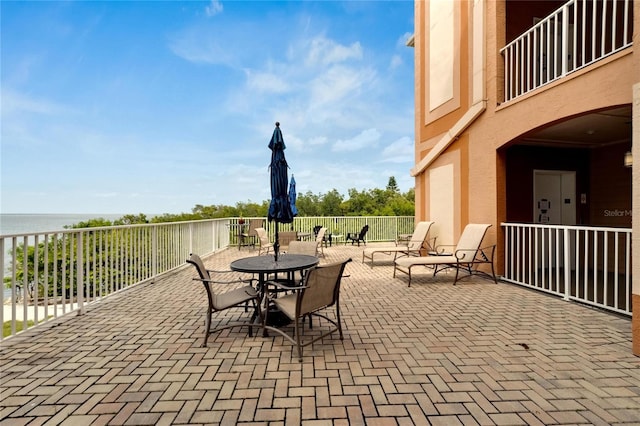 view of patio / terrace featuring a water view