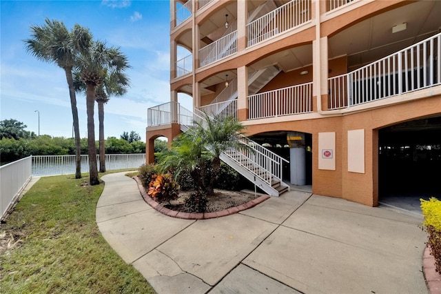 view of property with a water view