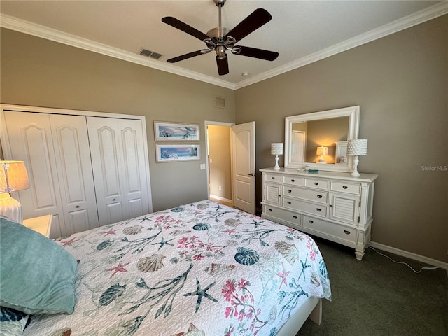 bedroom with dark colored carpet, ceiling fan, crown molding, and a closet