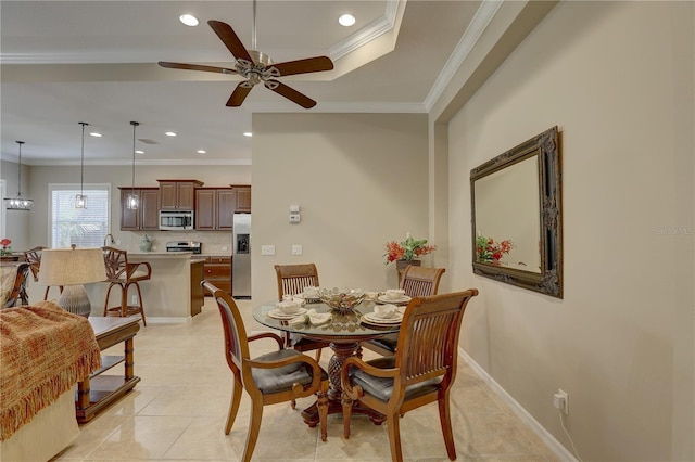 dining area with ornamental molding, ceiling fan, recessed lighting, and light tile patterned floors