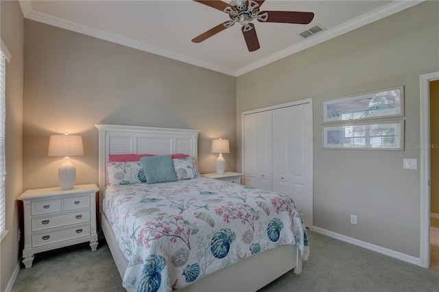 bedroom featuring a closet, visible vents, light colored carpet, and ornamental molding