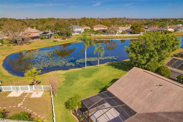 bird's eye view with a residential view and a water view