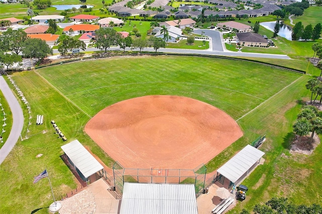 aerial view with a residential view and a water view