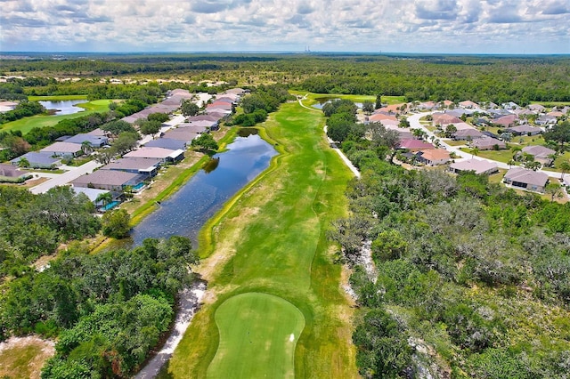 aerial view featuring a residential view, view of golf course, and a water view