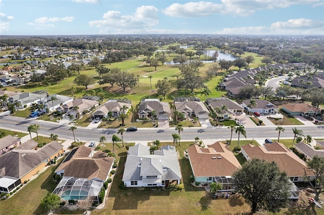 aerial view with a water view and a residential view