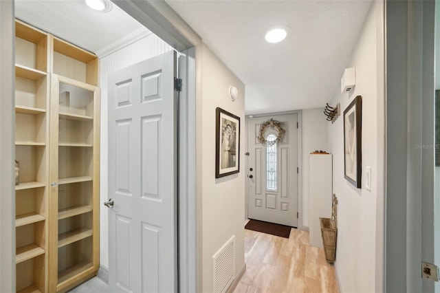 doorway featuring light hardwood / wood-style floors