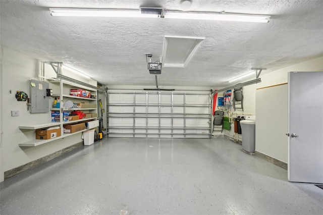 garage featuring a garage door opener and electric panel