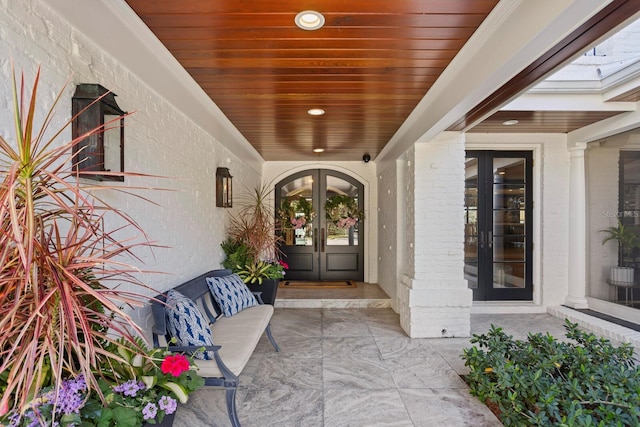 doorway to property featuring french doors