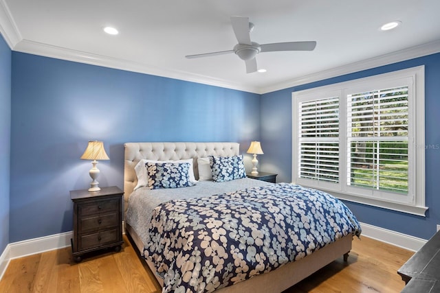 bedroom with crown molding, ceiling fan, and light wood-type flooring