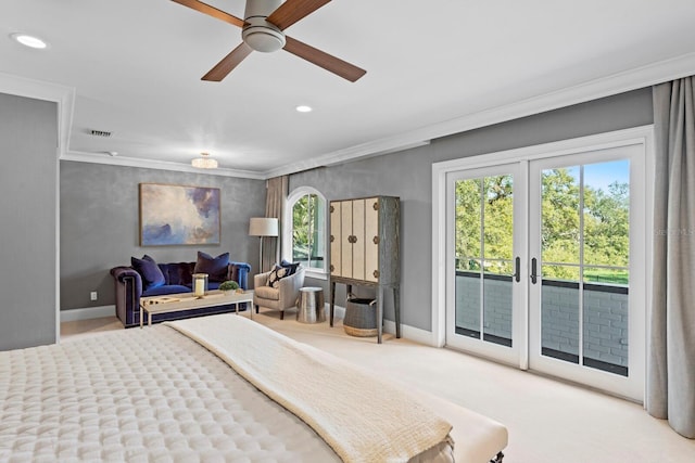 carpeted bedroom with crown molding, access to outside, and french doors