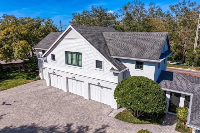 view of front of property featuring a garage