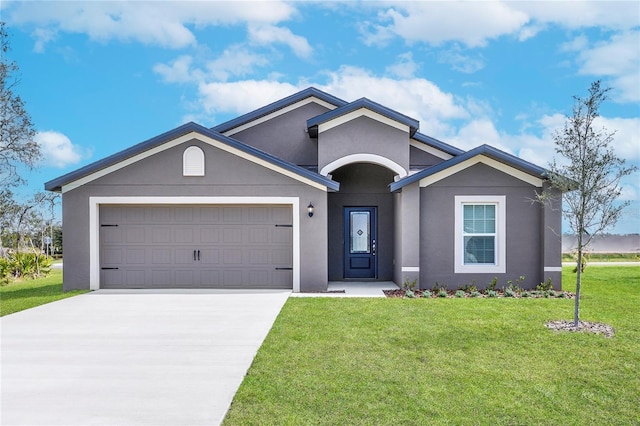 ranch-style home with a garage and a front yard