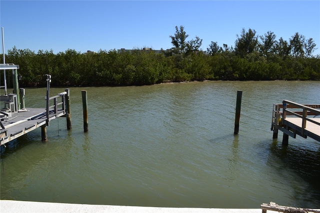 dock area featuring a water view